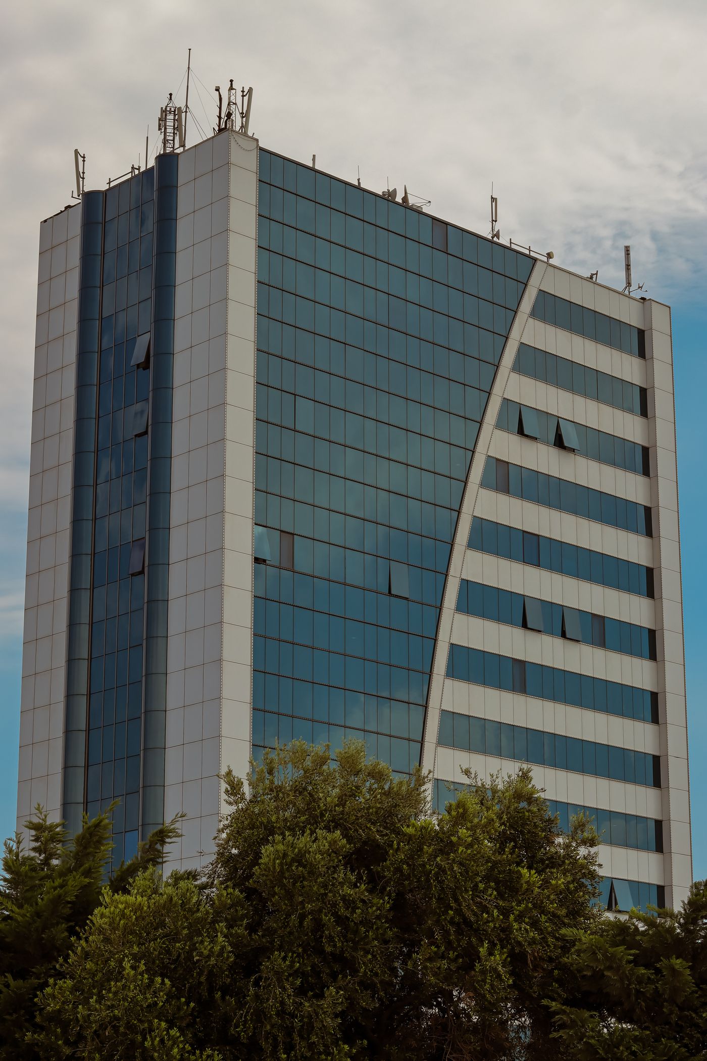 Modern commercial tower with a glass facade