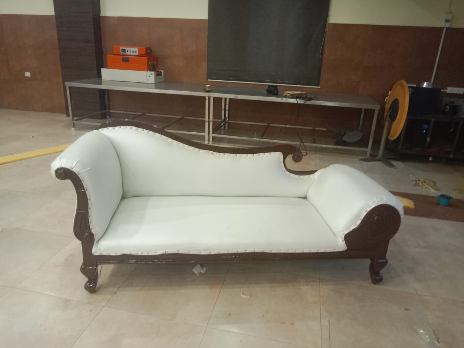 Classic wooden daybed with white upholstery